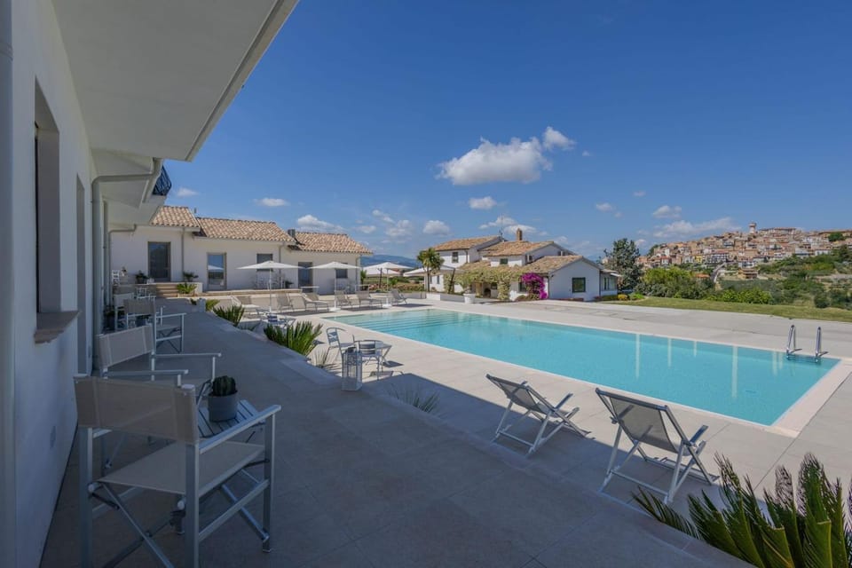 Property building, Pool view, Swimming pool, sunbed