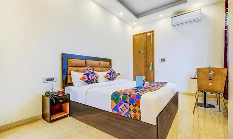 Bed, Seating area, Bedroom, wardrobe, air conditioner