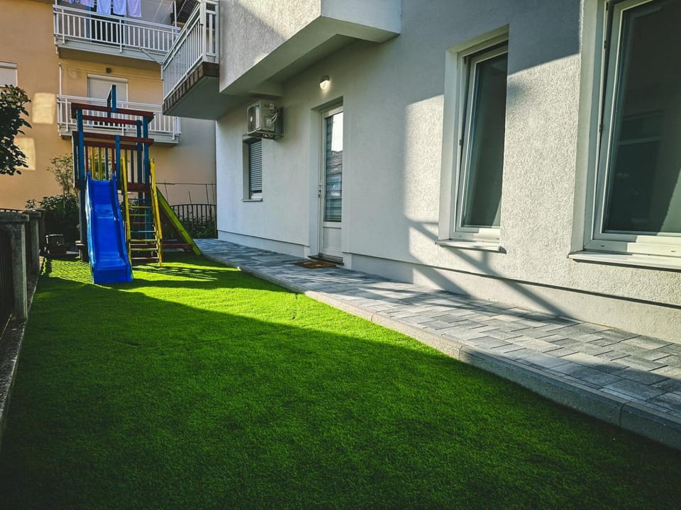 Property building, Children play ground, Garden