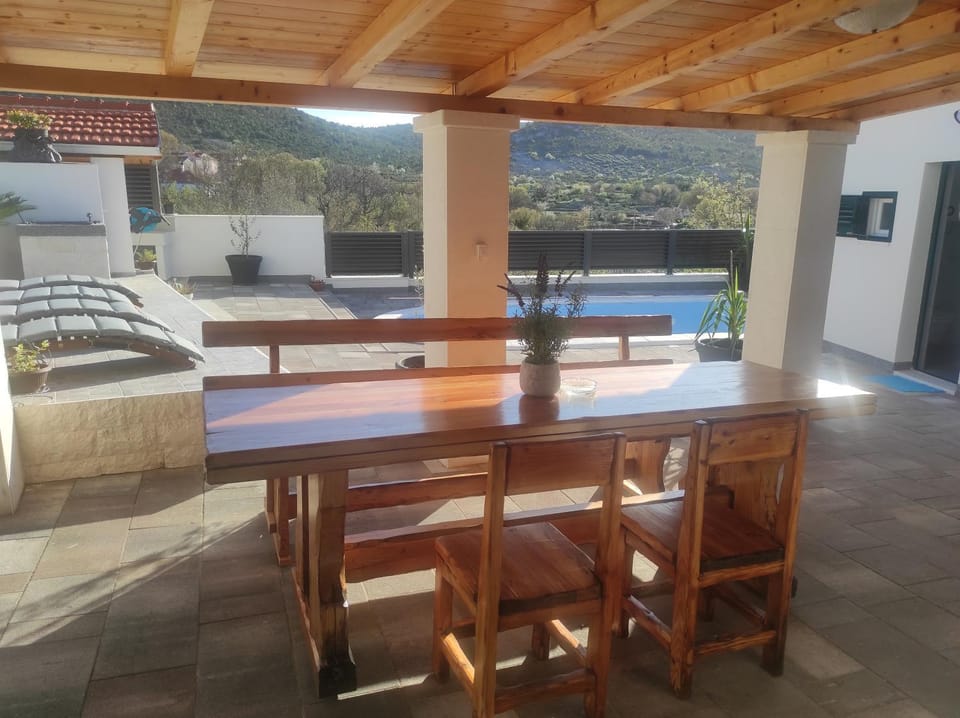 Patio, Day, Seating area, Pool view, Swimming pool