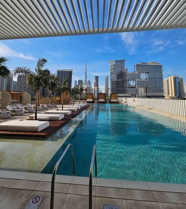 Houzzze #4 DesignStudio Burj Khalifa view Apartment in Dubai