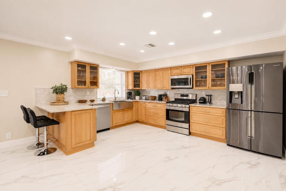 Kitchen or kitchenette, dishwasher, oven, stove, toaster