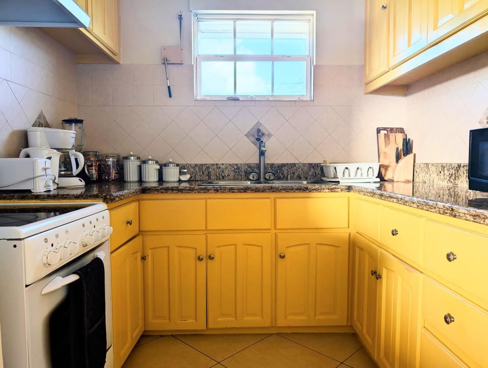 Kitchen or kitchenette, stove, toaster