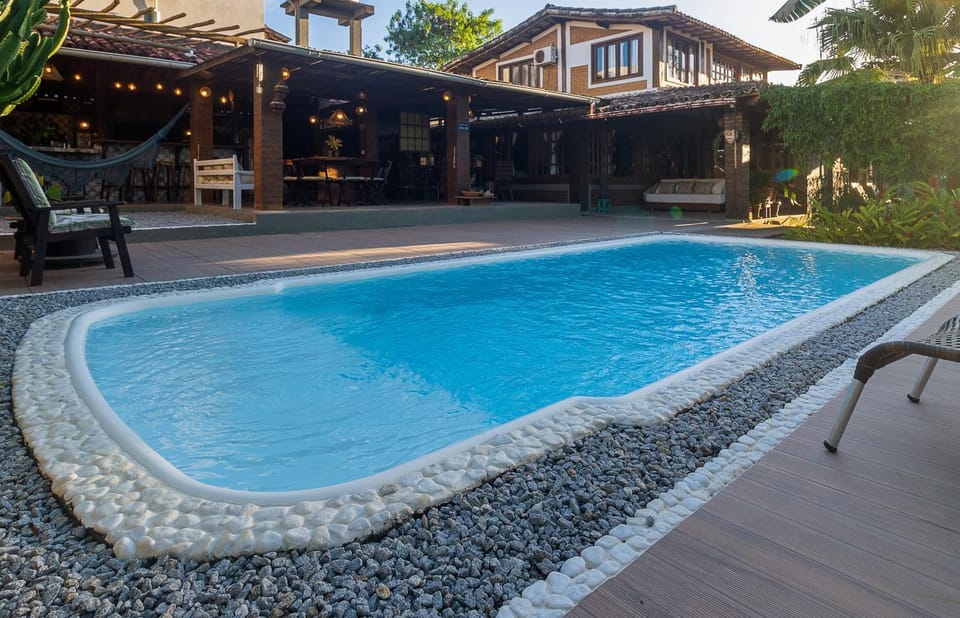 Property building, Day, Pool view, Swimming pool, sunbed