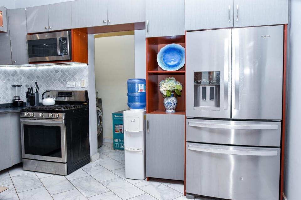 Kitchen or kitchenette, dishwasher, oven, stove, toaster