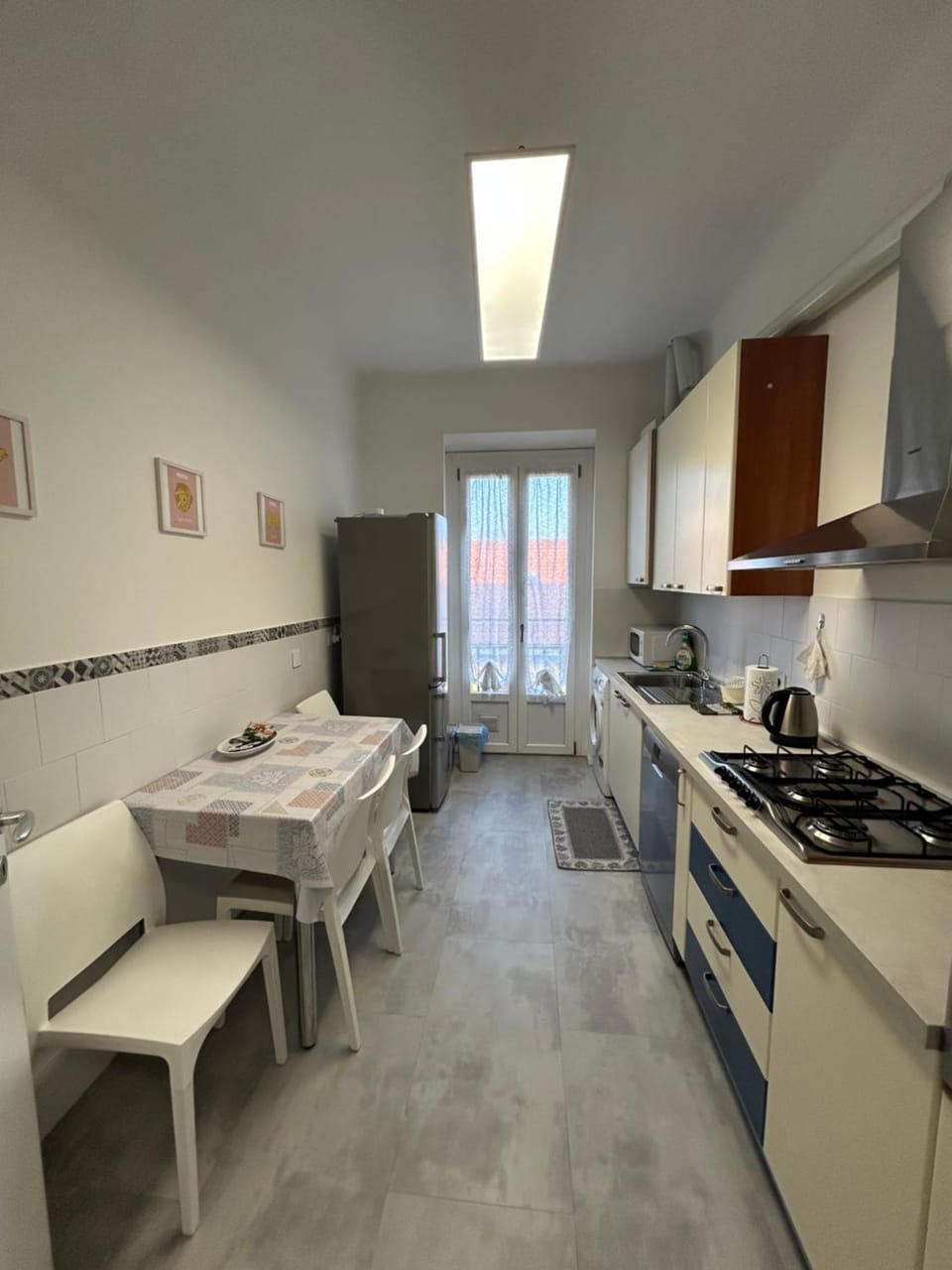 Kitchen or kitchenette, Dining area, dishwasher, oven, stove, washing machine