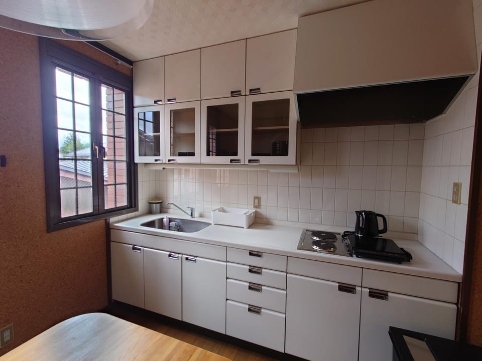 Kitchen or kitchenette, stove