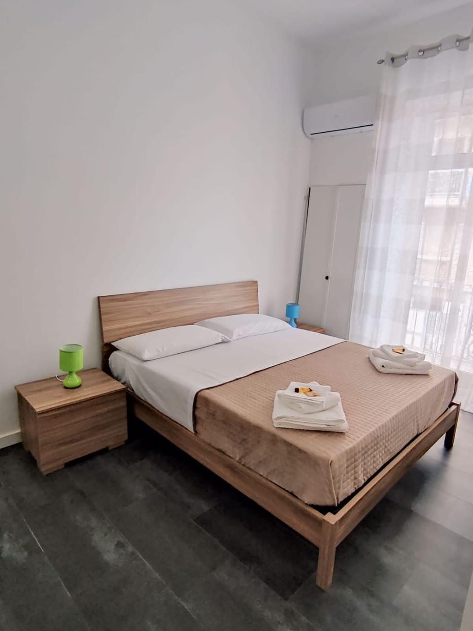 Bed, Photo of the whole room, Bedroom, towels, air conditioner