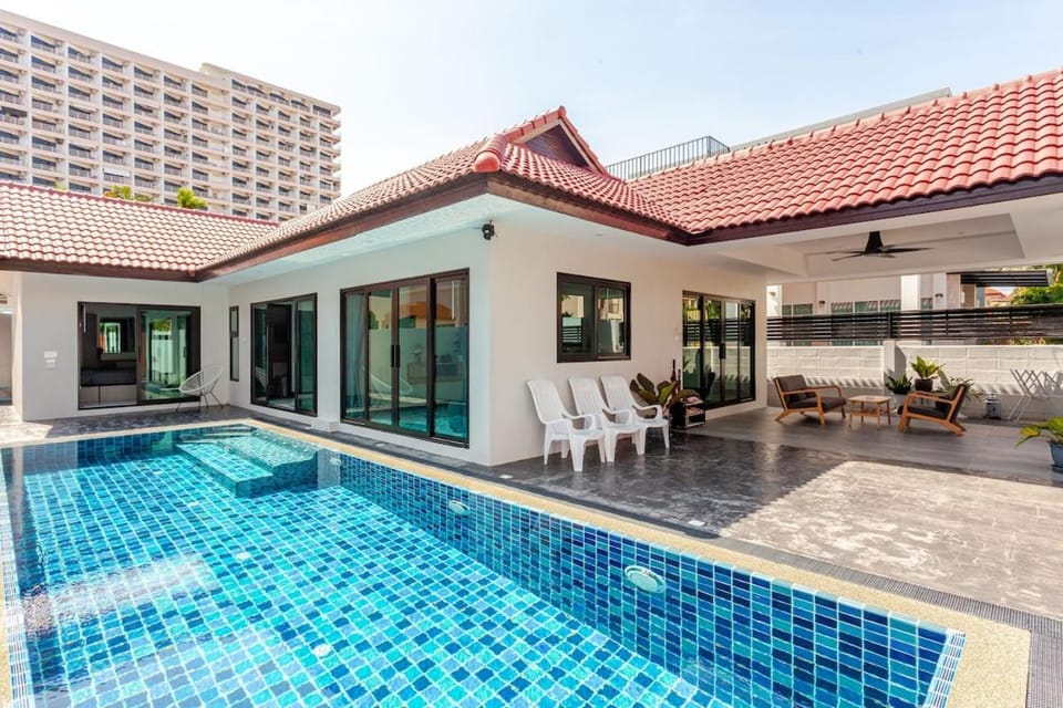 Experience perfect swimming pool water and Jacuzzi at Royal Park Village - Walk to the Beach Villa in Pattaya City