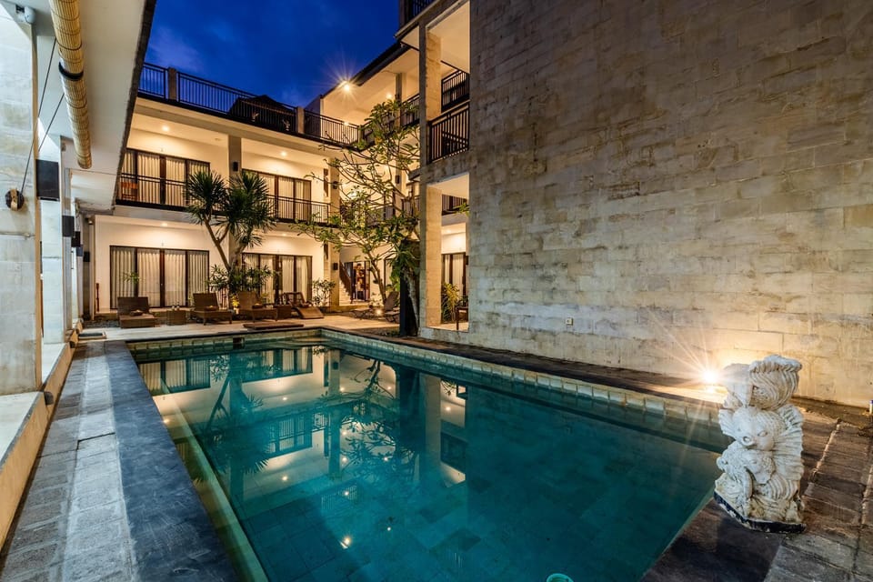 Property building, Patio, Night, Pool view, Swimming pool