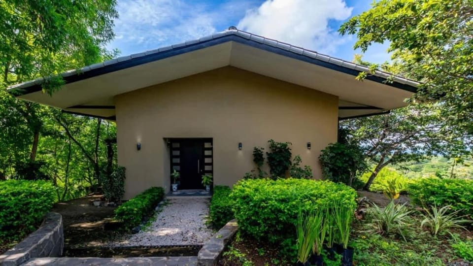 Nostalgic Retro Home on Luxurious Lot with a Private Infinity Pool and Ocean Views House in Guanacaste Province