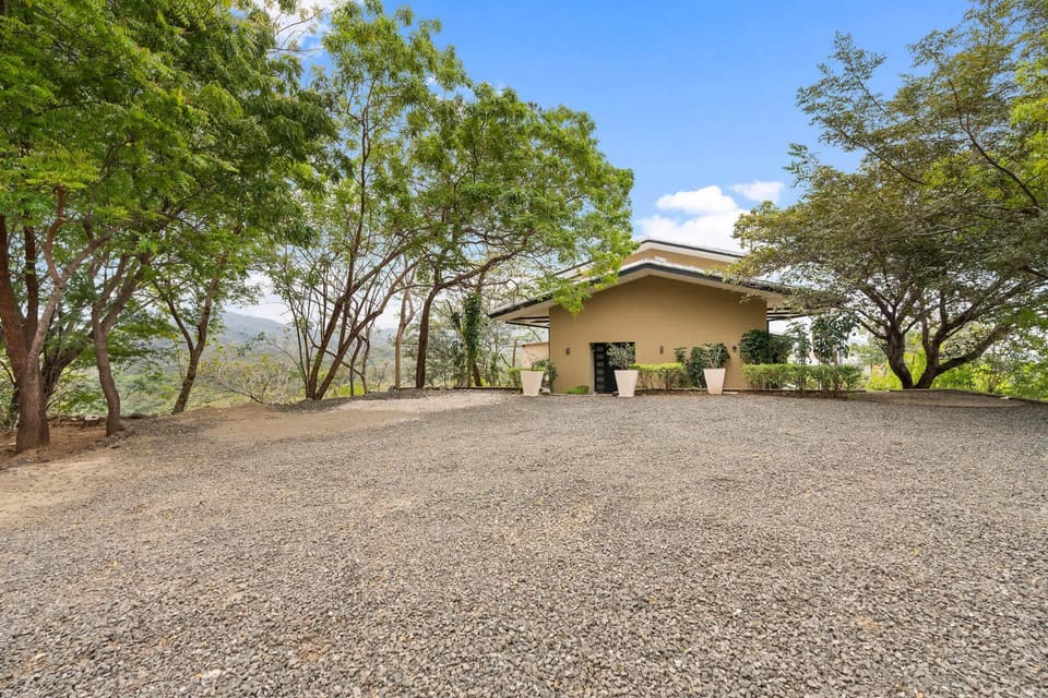 Nostalgic Retro Home on Luxurious Lot with a Private Infinity Pool and Ocean Views House in Guanacaste Province