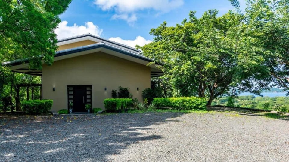 Nostalgic Retro Home on Luxurious Lot with a Private Infinity Pool and Ocean Views House in Guanacaste Province