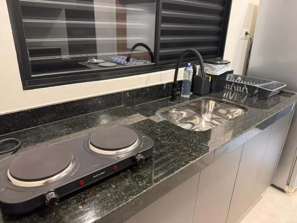 Kitchen or kitchenette, stove