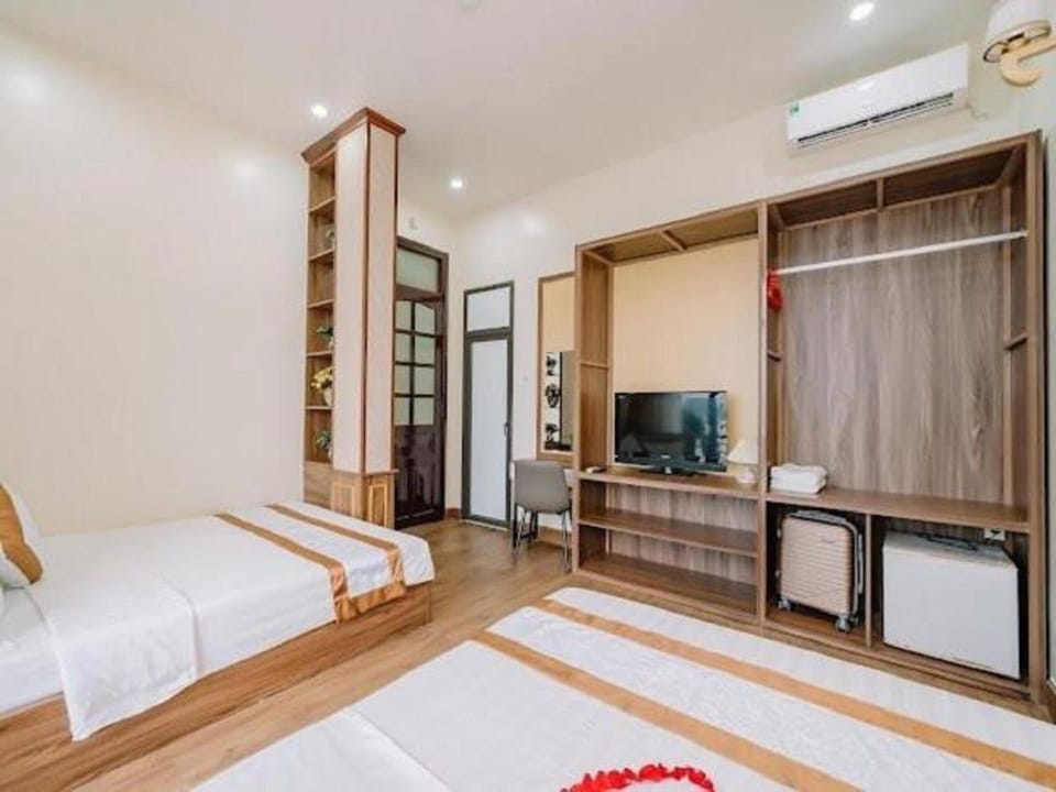 Communal lounge/ TV room, Bed, TV and multimedia, Living room, Seating area, Evening entertainment, Bedroom, air conditioner