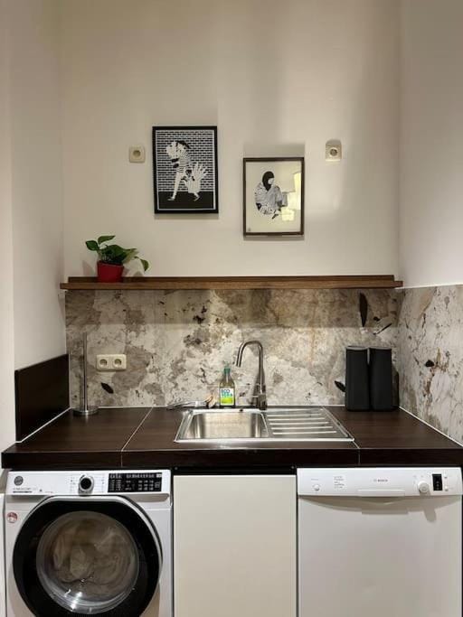 Kitchen or kitchenette, dishwasher, washing machine, dryer