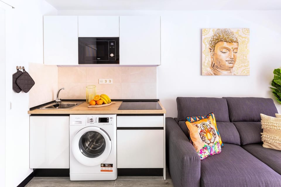 Kitchen or kitchenette, washing machine