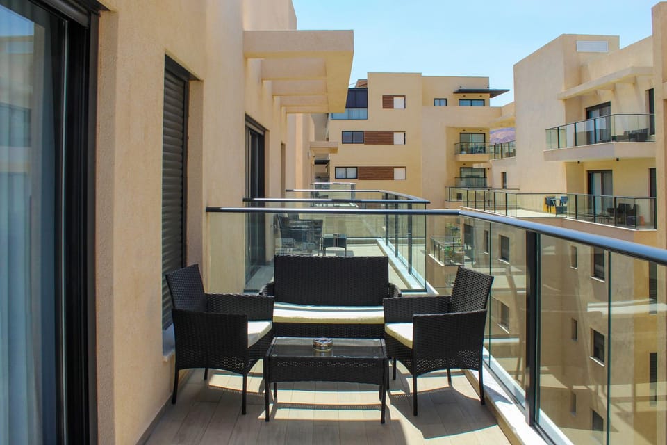 View (from property/room), Balcony/Terrace, Seating area, Inner courtyard view