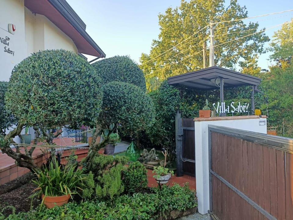 Property building, Day, Property logo or sign, Garden