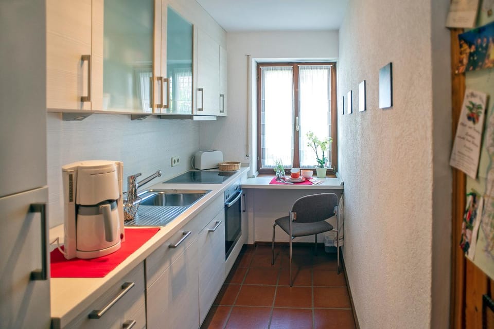 Kitchen or kitchenette, oven, stove, toaster