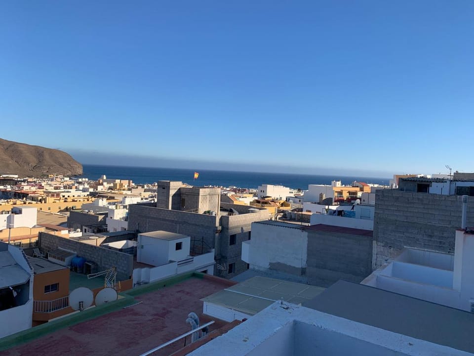 Property building, Day, Natural landscape, City view, Mountain view, Sea view