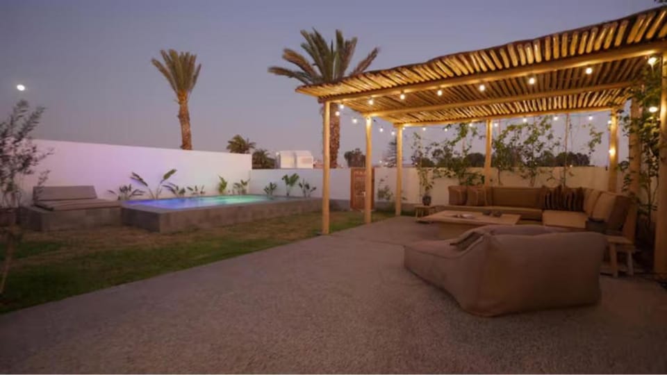 Relájate en piscina-spa, terraza BBQ y AC Paracas House in Paracas