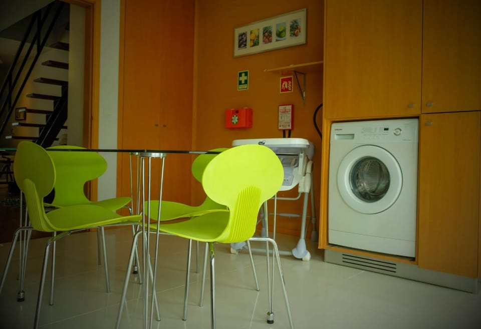 Kitchen or kitchenette, washing machine