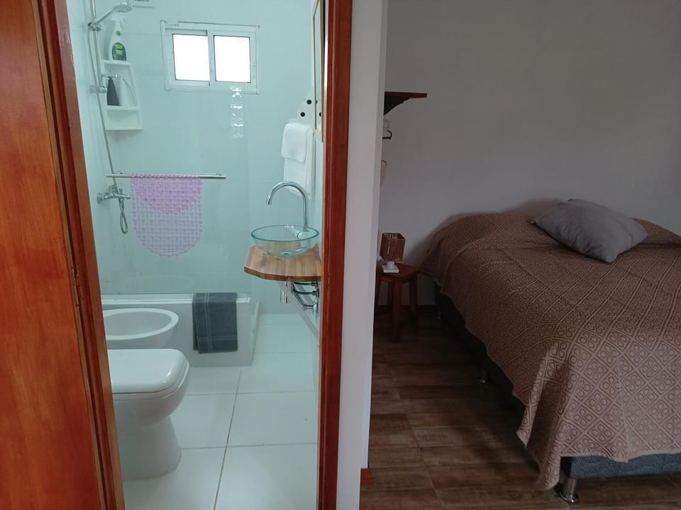 Shower, Toilet, Bed, Bathroom, Photo of the whole room, Bedroom, bidet, towels