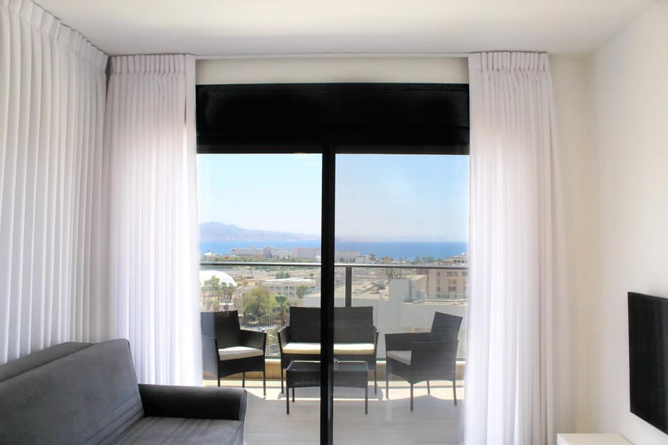 TV and multimedia, View (from property/room), Balcony/Terrace, Living room, Seating area, City view, Mountain view, Sea view