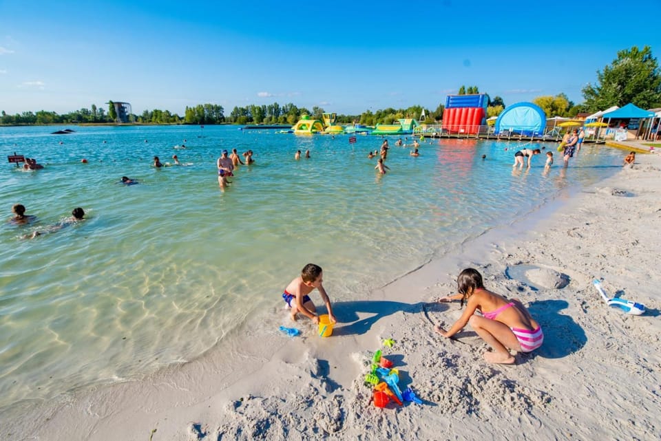 Off site, Day, People, Natural landscape, Activities, Children play ground, Beach, Aqua park, Windsurfing, Evening entertainment, Lake view, Sea view, children, group of guests, Open Air Bath, Family