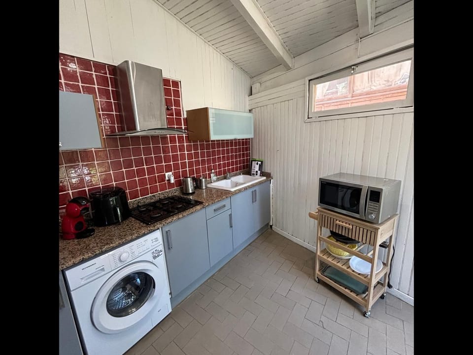 Kitchen or kitchenette, stove
