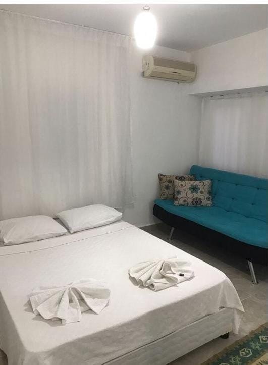 Bed, Photo of the whole room, Bedroom, towels, air conditioner