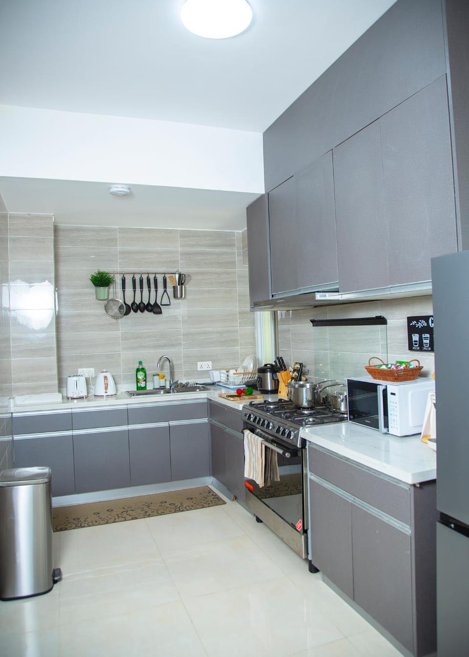 Kitchen or kitchenette, stove, toaster