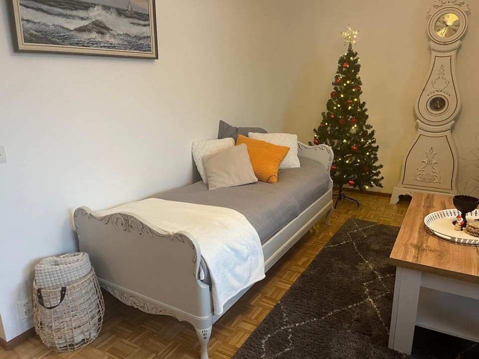 Bed, Living room, Seating area