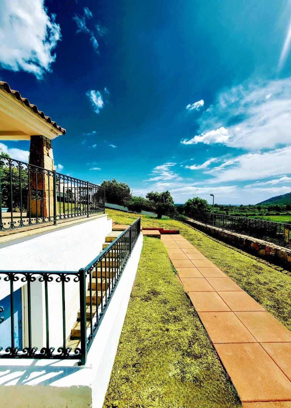 Property building, Patio, Facade/entrance, Natural landscape, Garden, View (from property/room), Balcony/Terrace, Garden view, Sea view