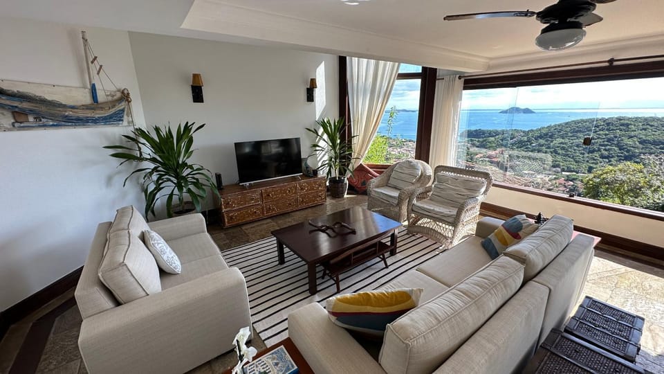 Communal lounge/ TV room, Day, Natural landscape, TV and multimedia, View (from property/room), Balcony/Terrace, Living room, Seating area, Evening entertainment, Mountain view, Sea view