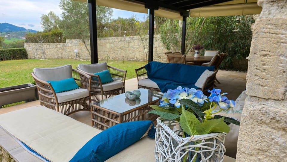 Patio, Natural landscape, Garden, Living room, Seating area, Garden view, Mountain view