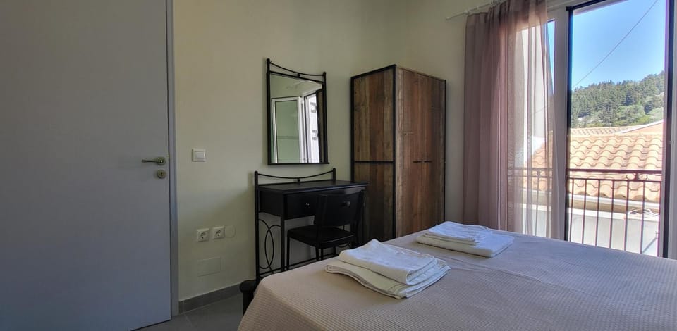 Bed, Photo of the whole room, Bedroom, hair dresser, towels, wardrobe