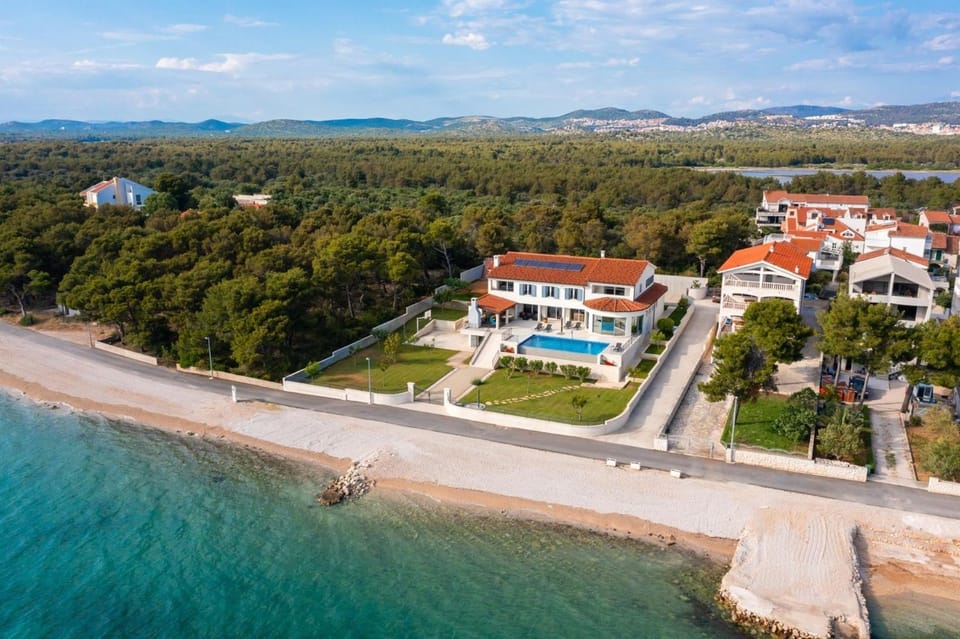 Property building, Natural landscape, Beach, Location