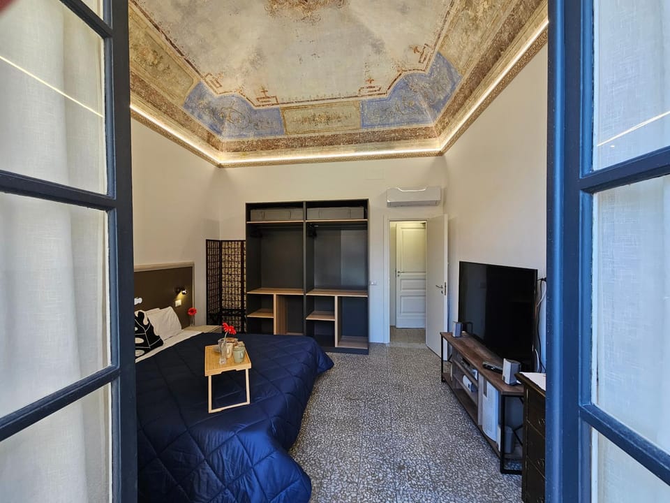 Bed, TV and multimedia, Decorative detail, Bedroom, furniture, wardrobe, air conditioner