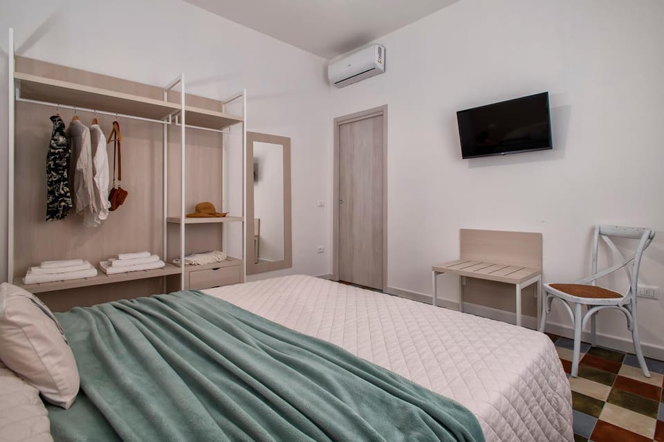 Bed, TV and multimedia, Bedroom, hair dresser, towels, wardrobe, air conditioner