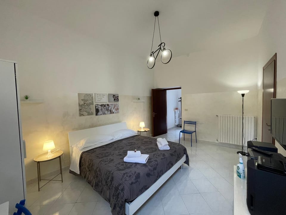 Bed, Photo of the whole room, Bedroom, hair dresser, towels, wardrobe