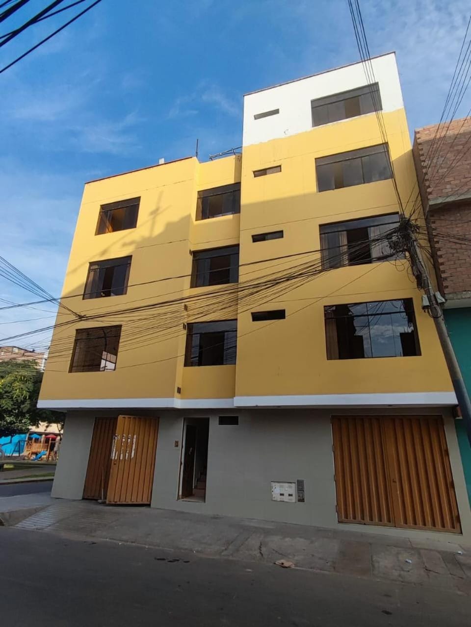 Property building, Day, Quiet street view