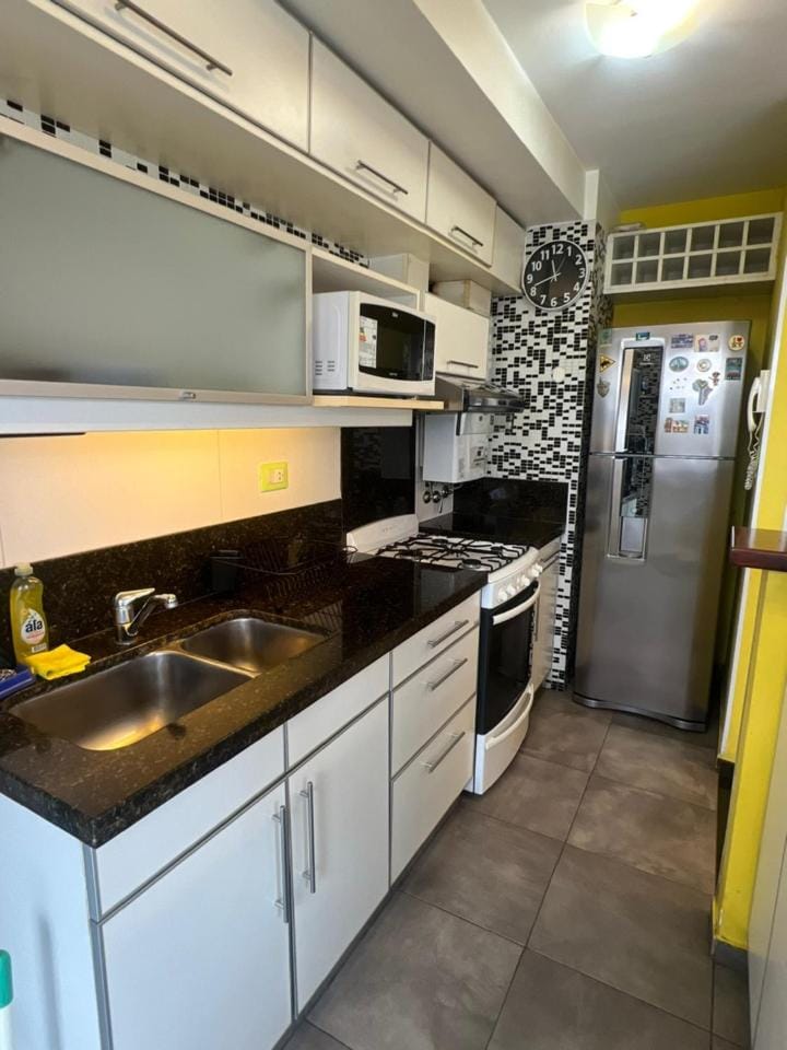 MORENO. DEPTO 2 DORMITORIOS DE CATEGORIA EN PLENO CENTRO. 2 BAÑOS. AMENITIES. COCHERA OPCIONAL Apartment in Rosario