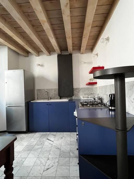 Kitchen or kitchenette, dishwasher, oven, stove