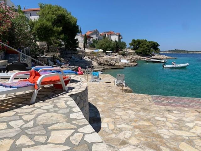 Property building, Nearby landmark, Beach