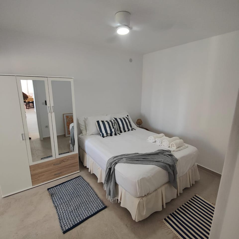 Bed, Photo of the whole room, Bedroom, towels, wardrobe