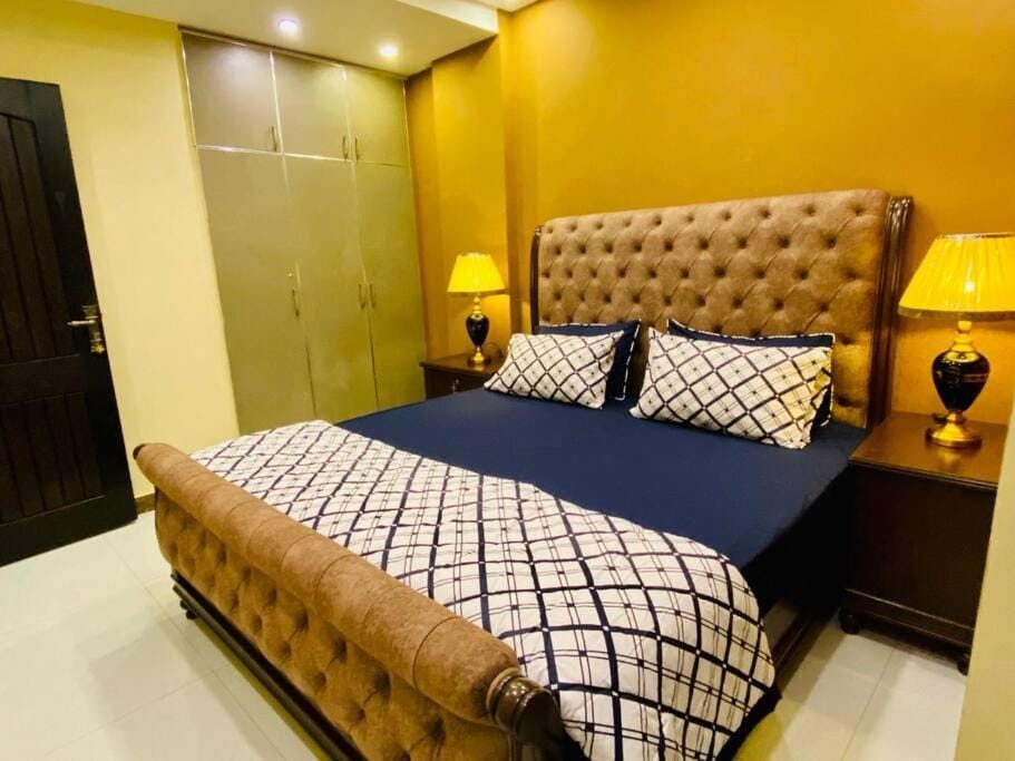 Bahria Town Lahore - NEXT INN Two Bedroom condo with free parking 203 Apartment in Lahore