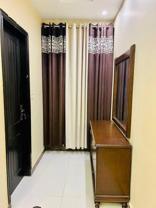 Bahria Town Lahore - NEXT INN Two Bedroom condo with free parking 203 Apartment in Lahore