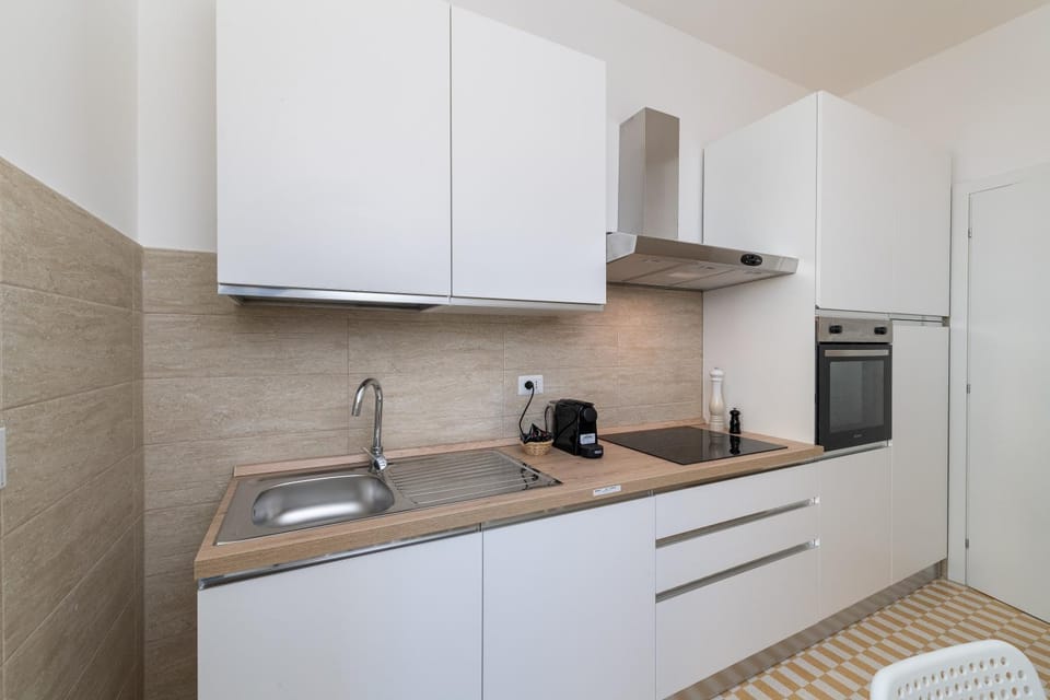 Kitchen or kitchenette, stove